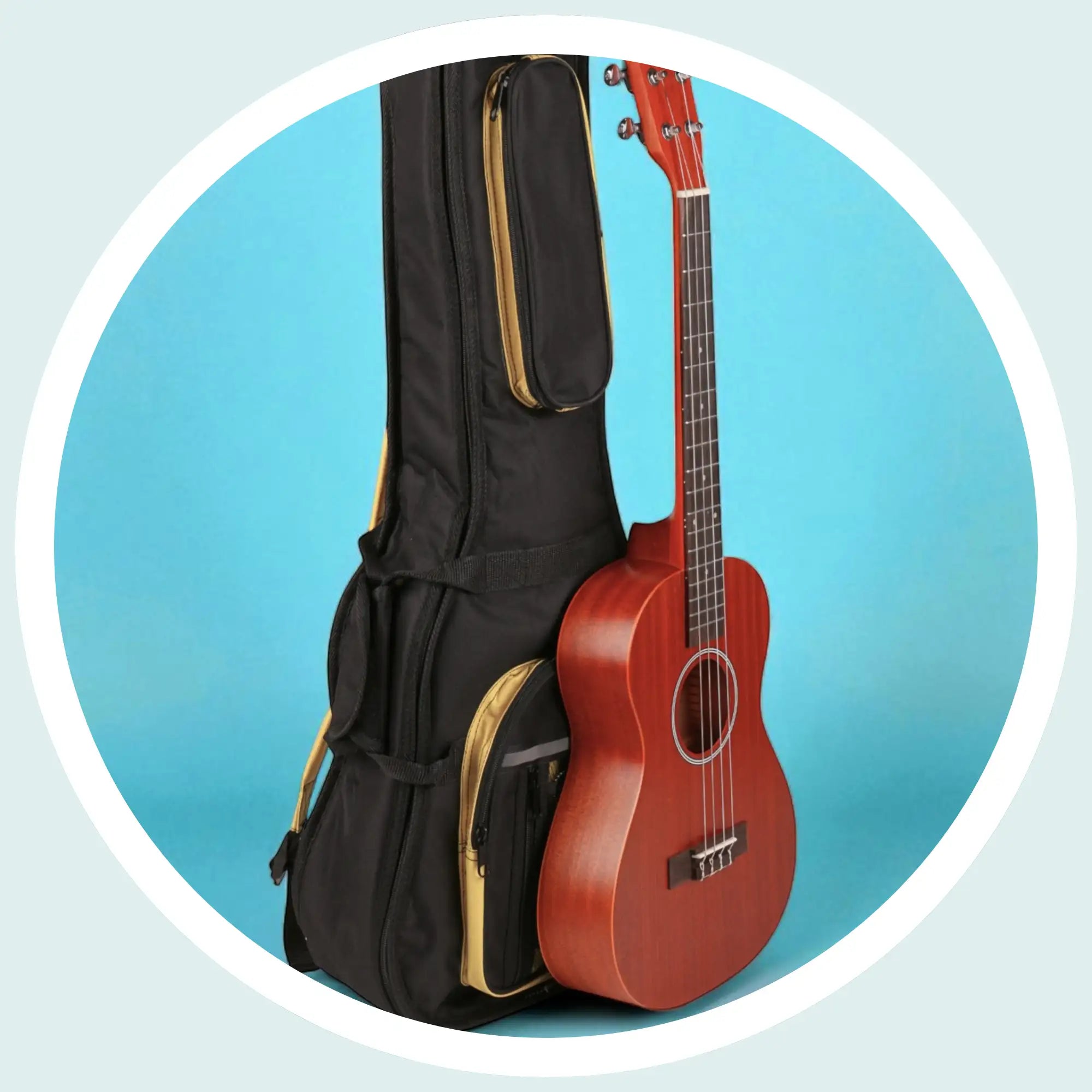 Red wooden ukulele with a glossy finish and black tuning pegs.