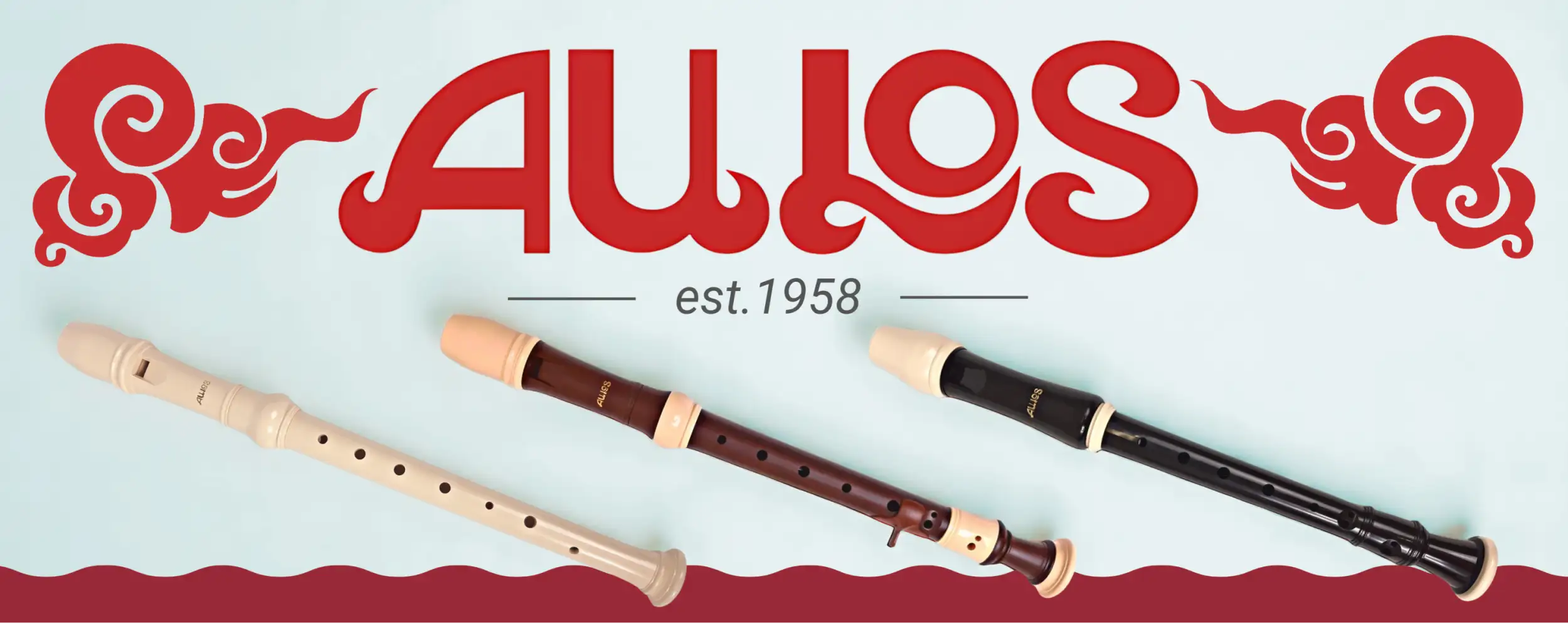 Three au los recorders, featuring natural wood tones and black finishes with cream-colored end caps.