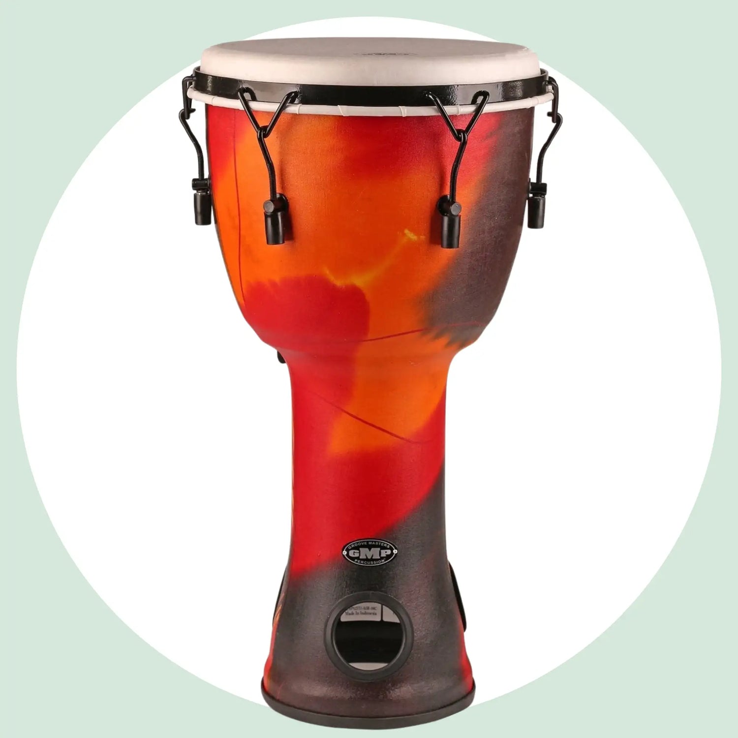 Vibrant orange and red gradient-finish djembe drum with black hardware and a white head, branded dmp.