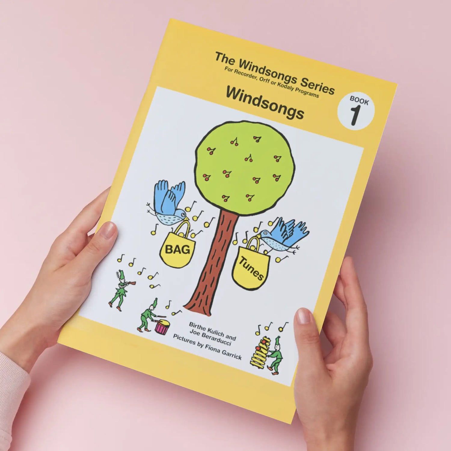 Yellow-covered music book titled ’windsongs’ from the windsongs series, book 1.